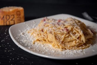 pasta dish on white ceramic plate