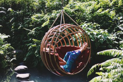 person on the hanging chair