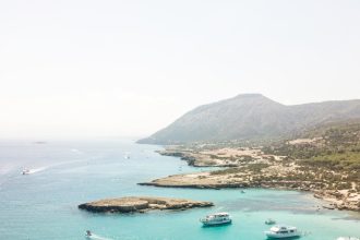 yachts on body of water at daytime
