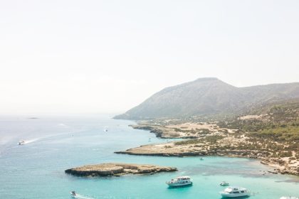yachts on body of water at daytime