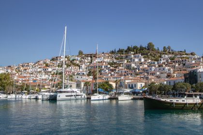 white boat on dock during daytime