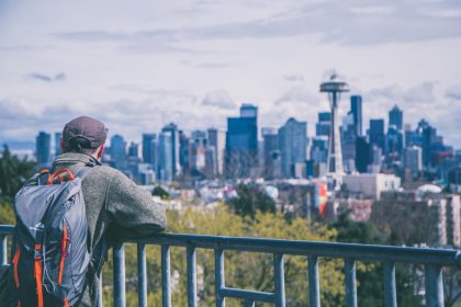 man overlooking space needle