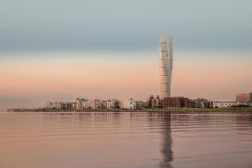 Turning Torso Reflecting in the Water at Sunset in Malmo, Sweden