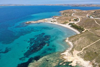 an aerial view of a beach and ocean