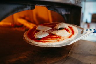 a pizza is being cooked