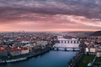 aerial photography of city under cloudy sky